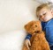 Child sleeping with bear.